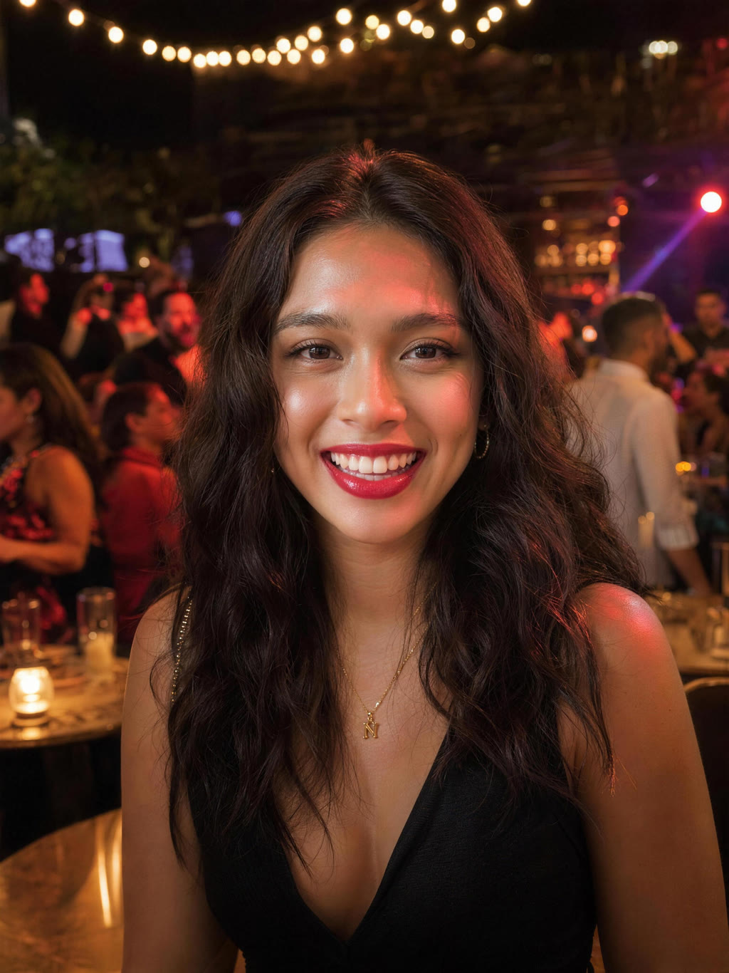 Ranza dressed up at a venue at night